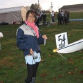 Nina Ma Putting on Bow Number